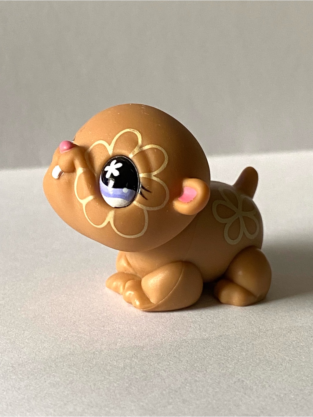 Littlest Pet Shop hamster figure in the large-headed Hasbro style with a printed flower pattern and painted eyes